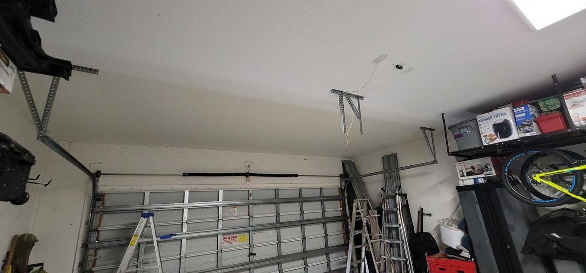 Garage camera opener installation by OM Garage Door Florida