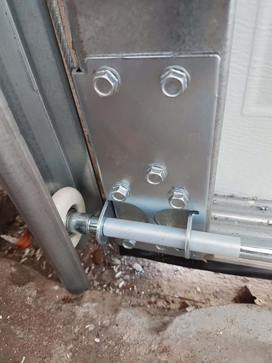 Garage door roller hardware close-up — quality replacement parts