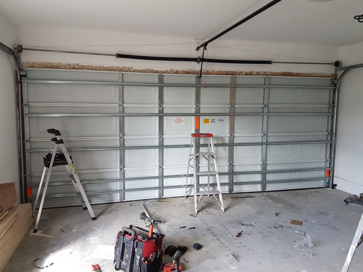 Interior view of new garage door installation by OM Garage Door Florida
